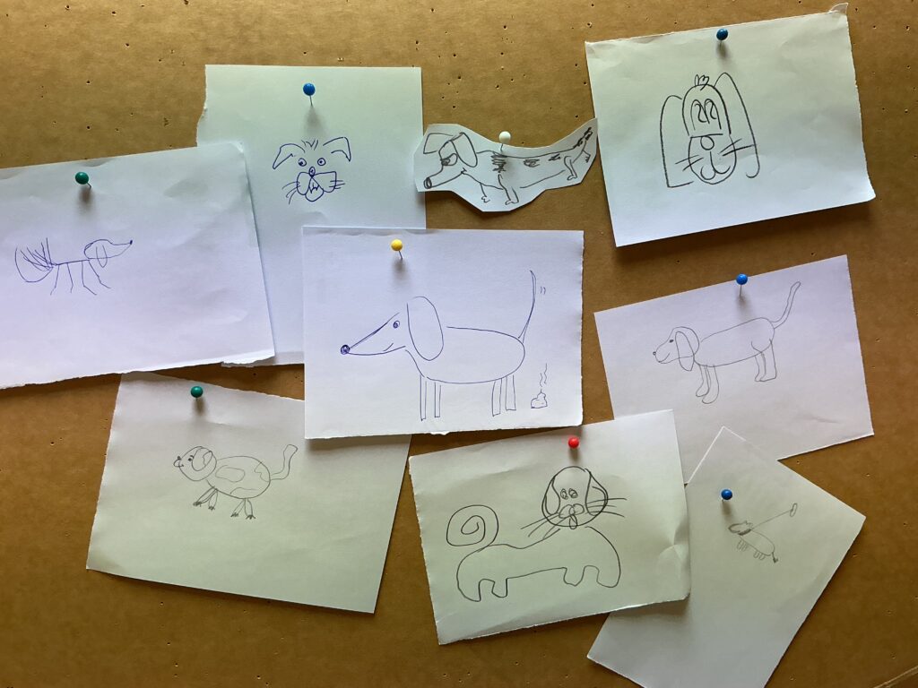 Viele Handzeichnungen eines Hundes